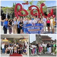 a group of people posing in front of a welcome sign