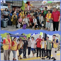 a group of people posing for a photo at an airport